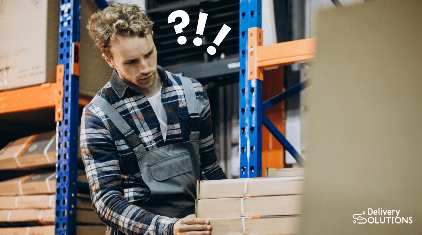A confused employee in the warehouse
